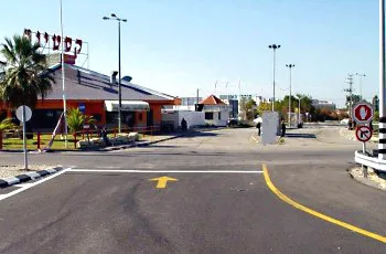 What are the permitted driving directions according to the traffic signs in the following…